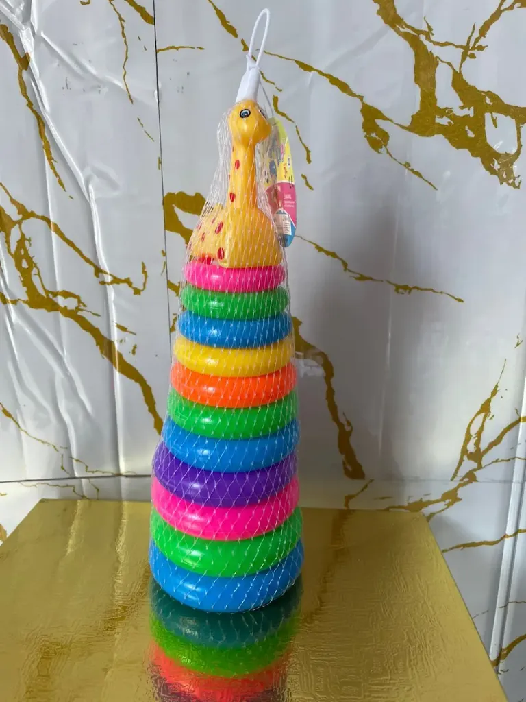 Baby stacking ring toy featuring colorful rings and a giraffe-shaped topper