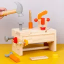 Toolbox Toy, featuring a wooden workbench set for DIY disassembly and assembly.