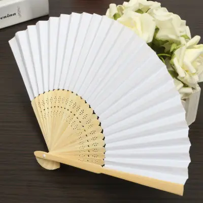 Handheld folding fan featuring a plain white paper canopy and a natural bamboo rib structure.