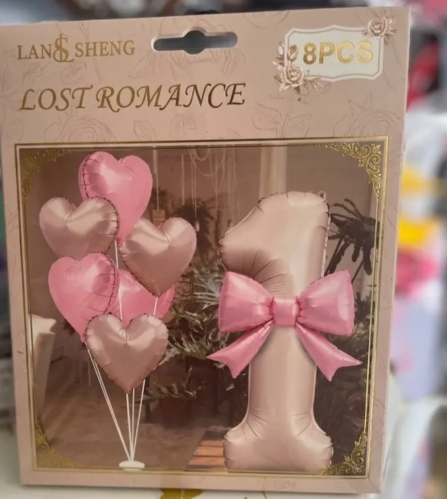 Balloon set includes a large number  foil balloon with a pink bow and several heart-shaped balloons. 8 pieces