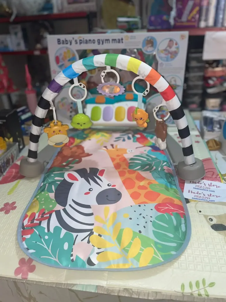 Colorful safari mat with a zebra and giraffe graphic, an arched toy bar, and an interactive light-up musical piano toy(High quality)